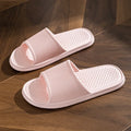Unisex summer slippers with non-slip foam sole and rhombus-striped EVA upper in solid colour