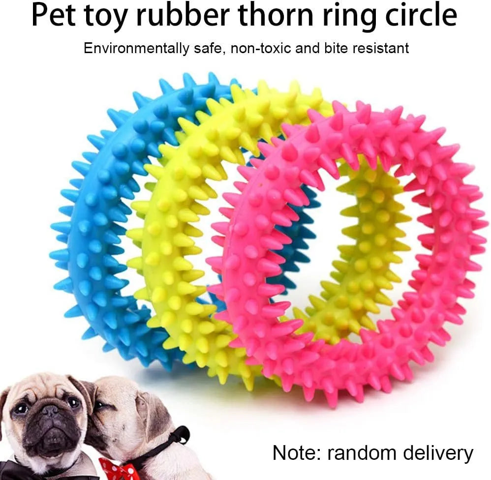 Blue TPR spiky ring dog chew toy for dental cleaning and bite training on a white background.