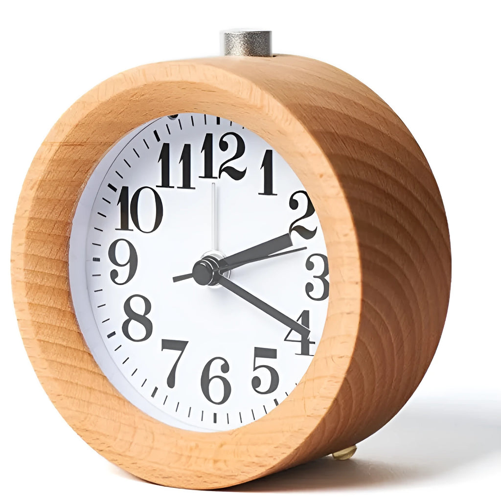 Solid beech wood analogue alarm clock with silent snooze on wooden surface