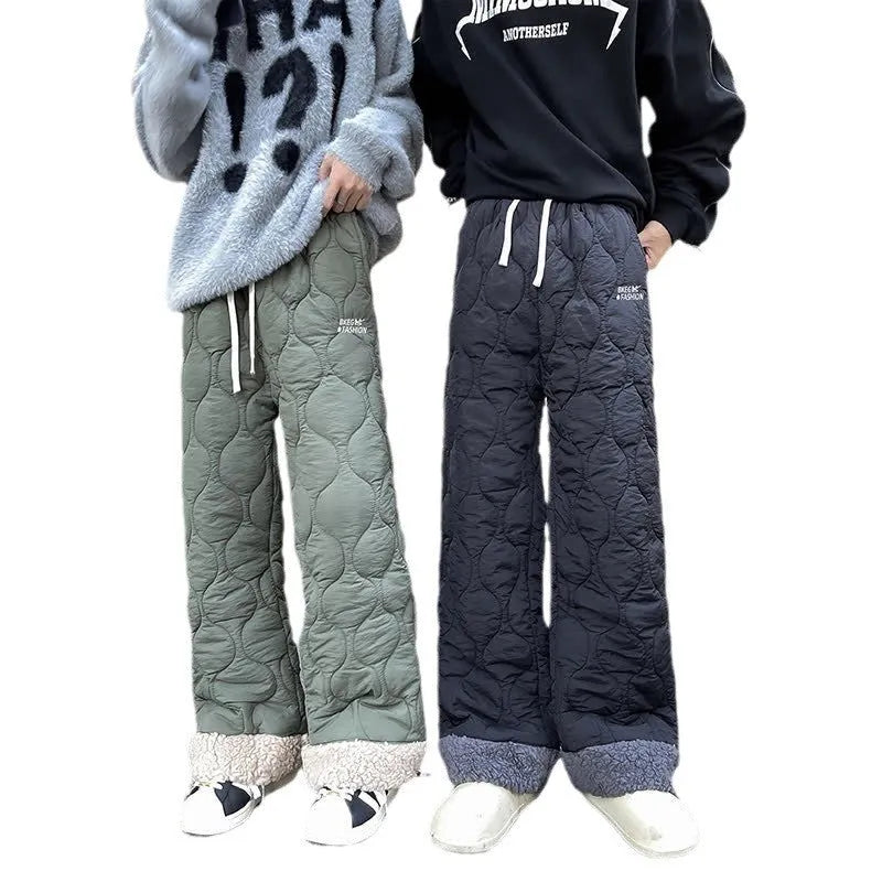 Winter cotton-padded waterproof patchwork lambskin cotton pants in black, side view