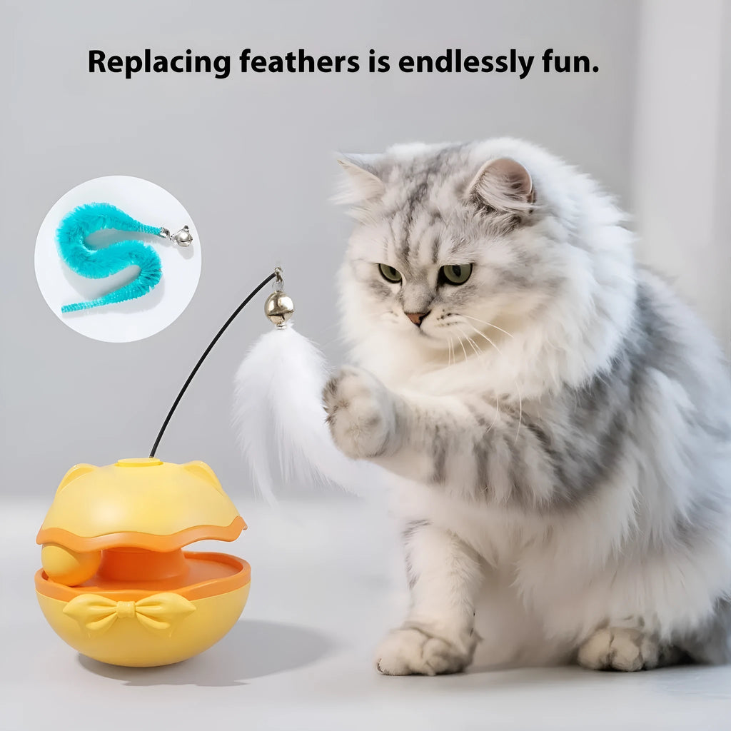 Electric cat toy tumbler in soft fog grey, showing self-righting design on a wooden floor.