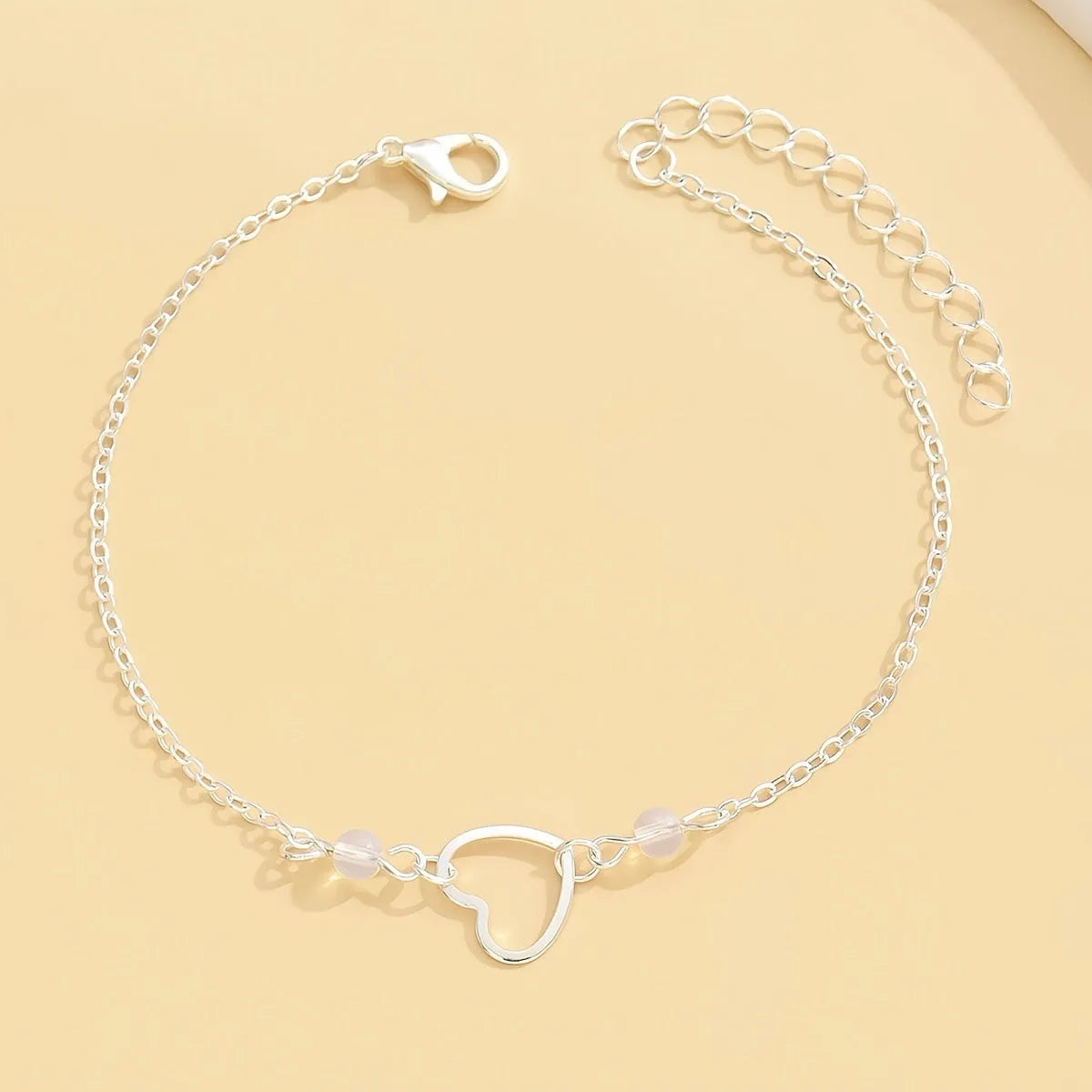 Women's adjustable heart pendant anklet in gold and silver alloy metal jewellery