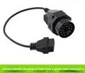 BMW 20-pin to standard 16-pin OBD2 diagnostic adapter cable on a white background