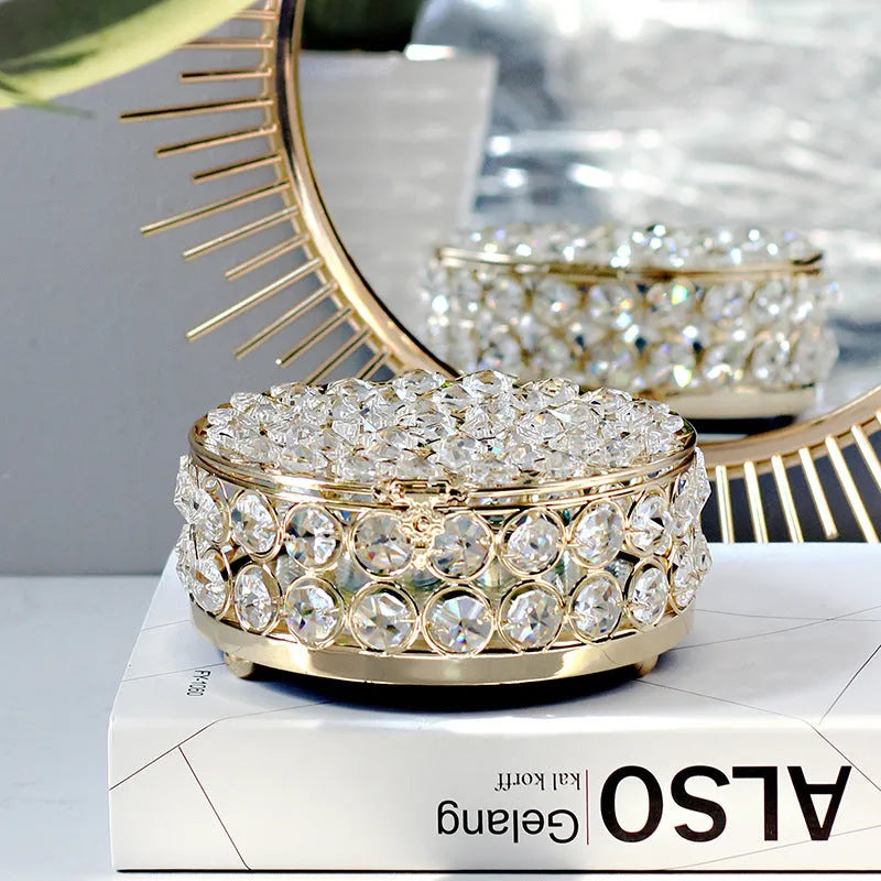 French gold iron frame transparent crystal glass jewelry storage box on a table