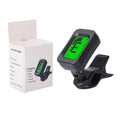 Automatic clip-on multi-function guitar tuner with LCD display attached to an acoustic guitar headstock