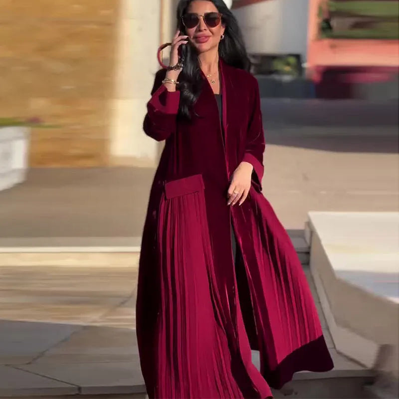 Women's pleated stitching coat in wine red, long sleeves, polyester fabric, street hipster style, front view.