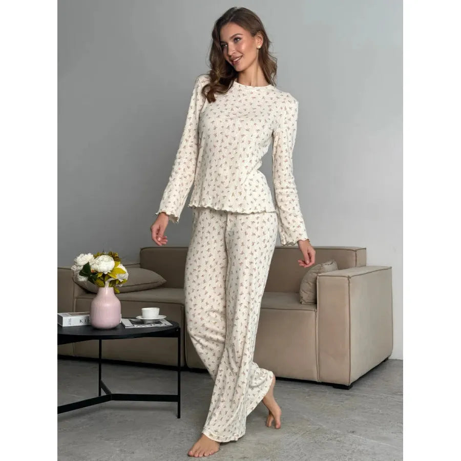 Women's white floral print two-piece suit with bell sleeve top and wide leg pants