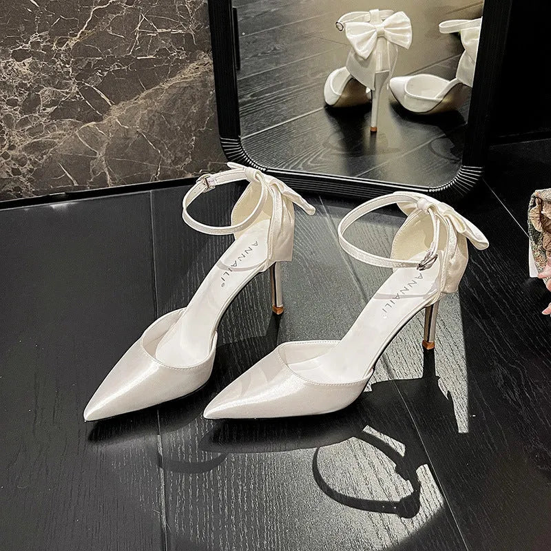 Satin white wedding shoes plus size with ankle buckle closure and 7cm heel on white background