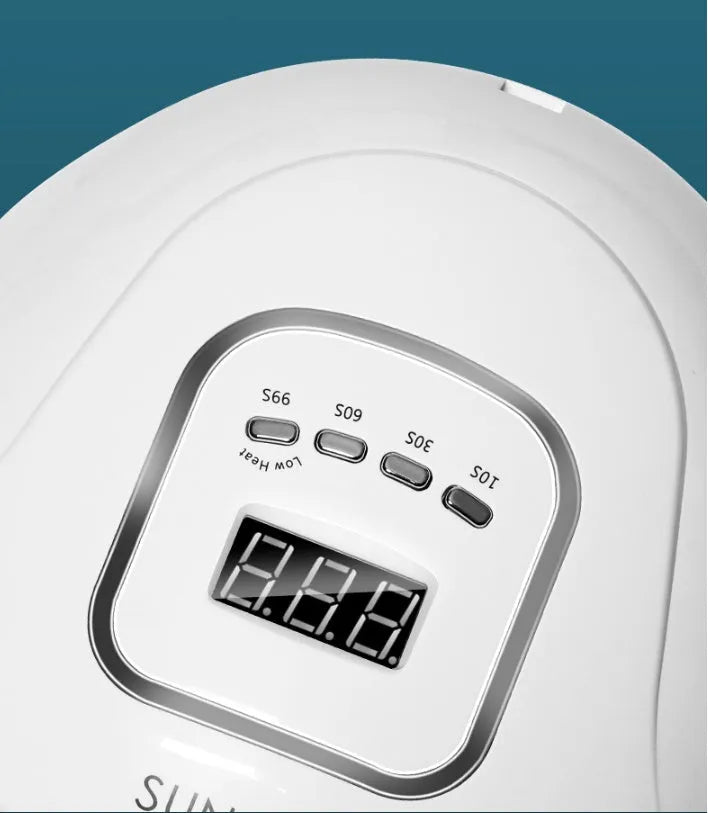 White ABS plastic nail curing lamp with dual UV and LED lights and timer buttons.