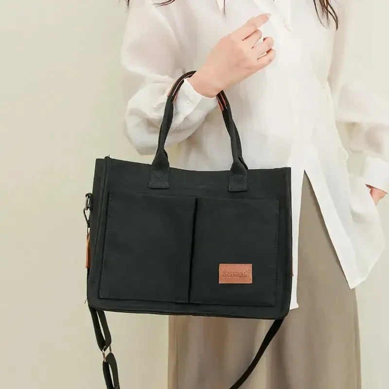 Large capacity canvas tote bag for women with multiple pockets and crossbody strap in creamy white