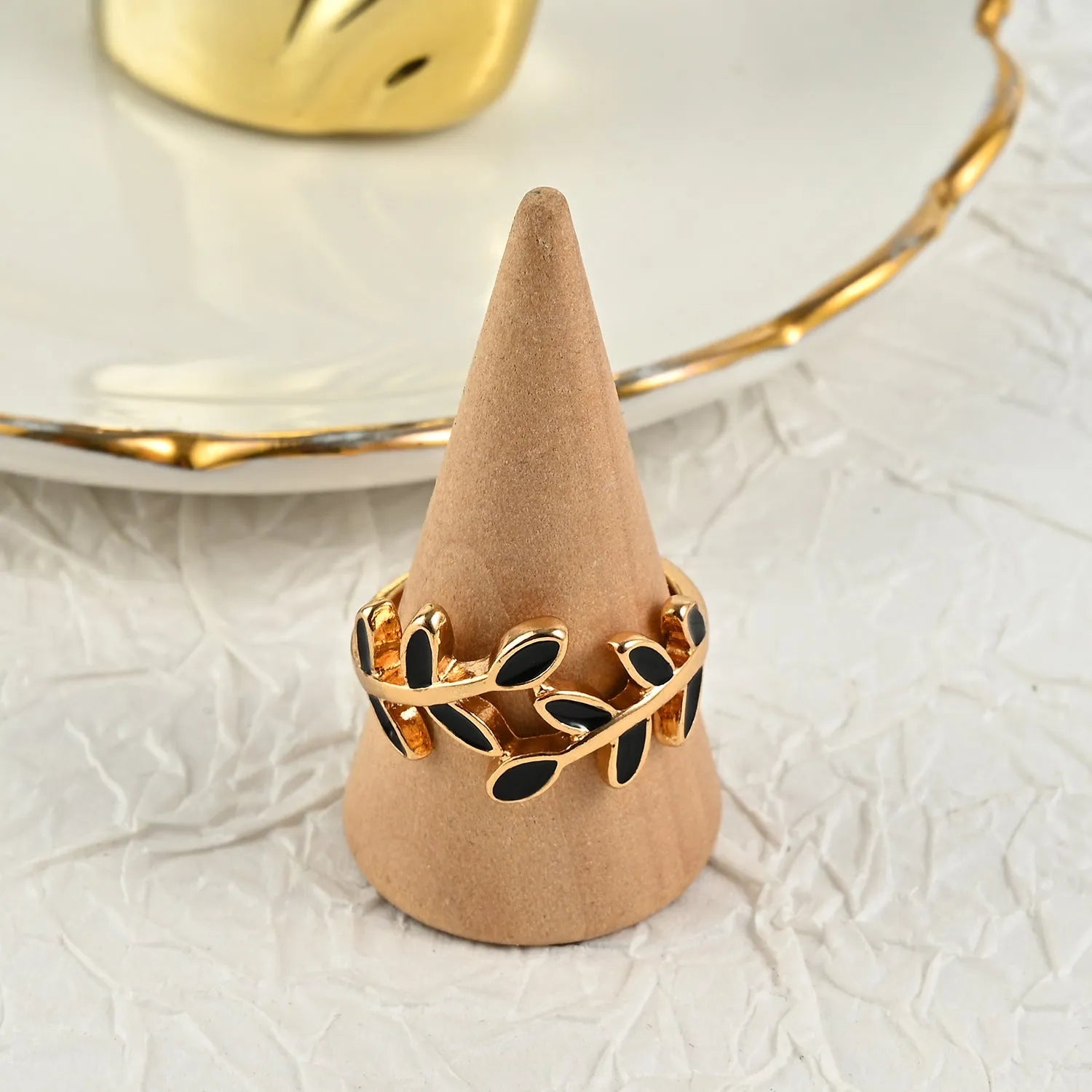 Gold electroplated acrylic fashion ring with geometric leaf design in floral shape for women