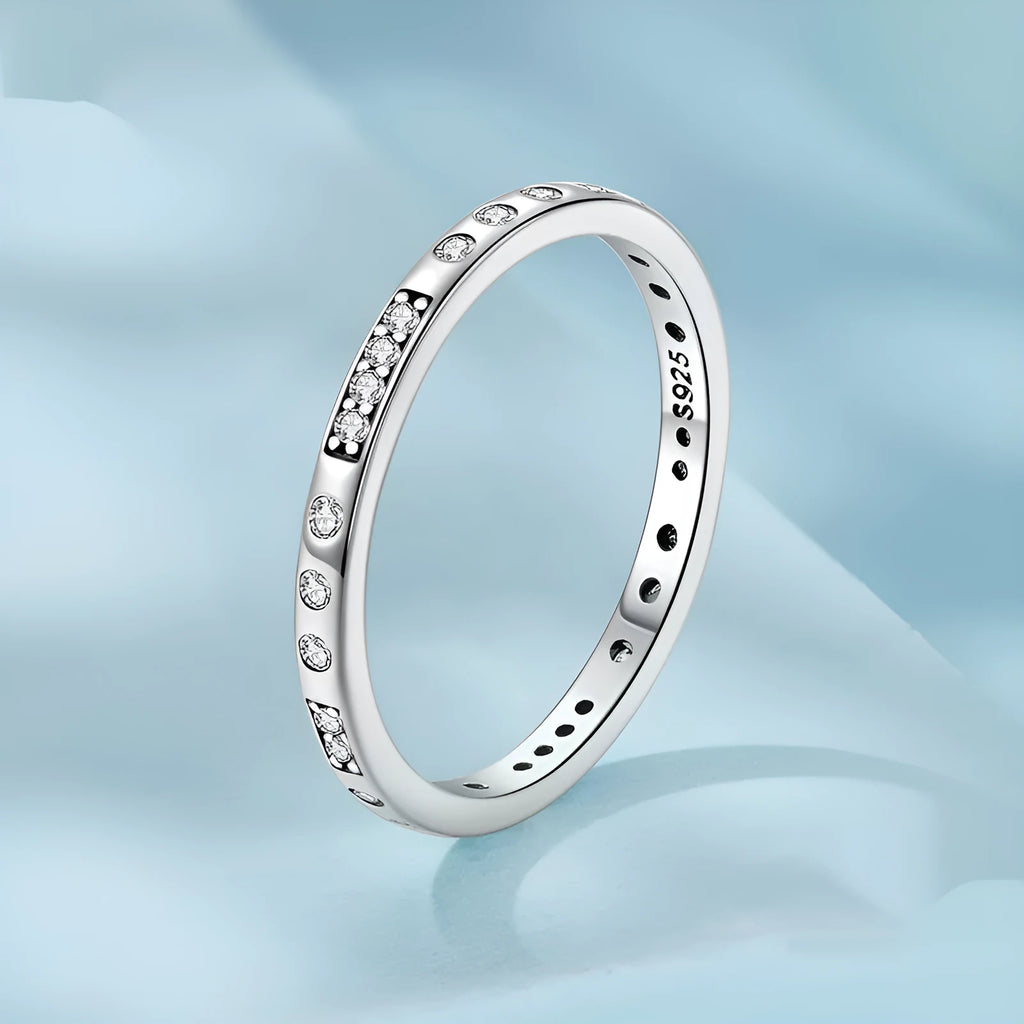 Silver I Love You Moss password ring with oxidized black finish showing engraved code