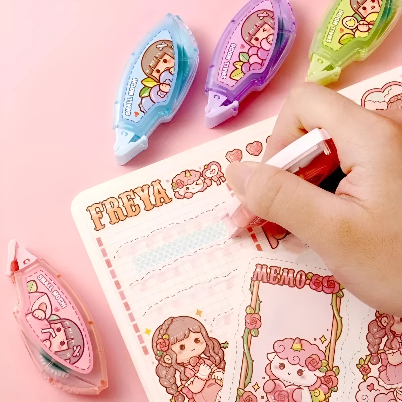Peach juice coloured dotting glue adhesive dot on a white plastic card for crafts and stationery