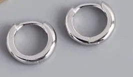Women's sterling silver round stud earrings in gold and silver finishes
