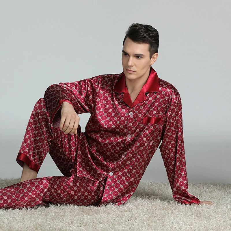 Men's red and blue printed imitation silk pajama suit with lapel collar, long sleeves, and trousers on a model