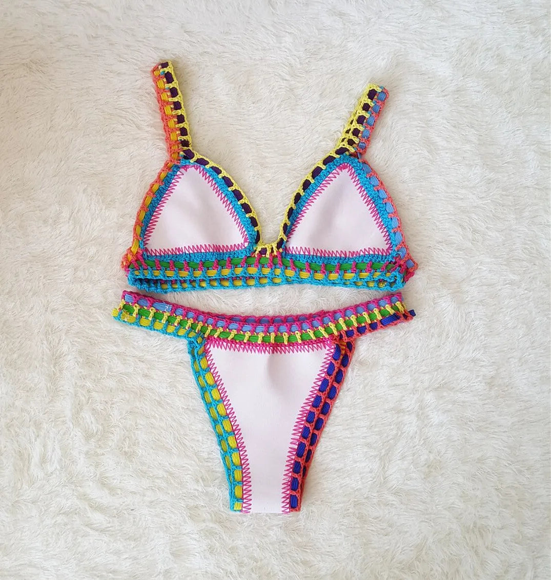 Hand crochet colourful bikini set with lace trim and rubber straps in multiple colours on white background