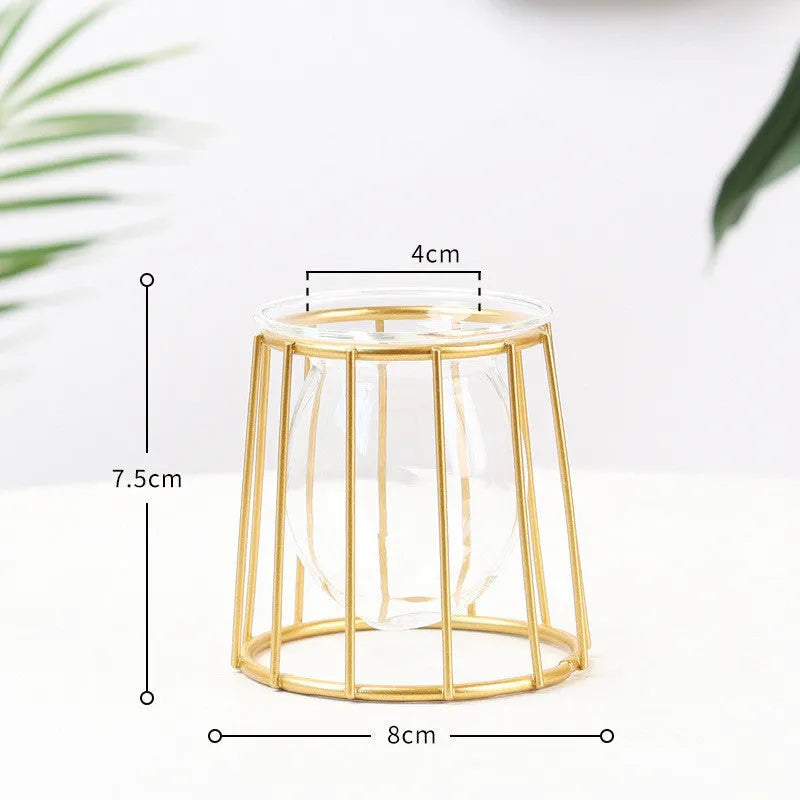 Nordic glass and iron desktop decoration in diamond gold shape on a wooden surface