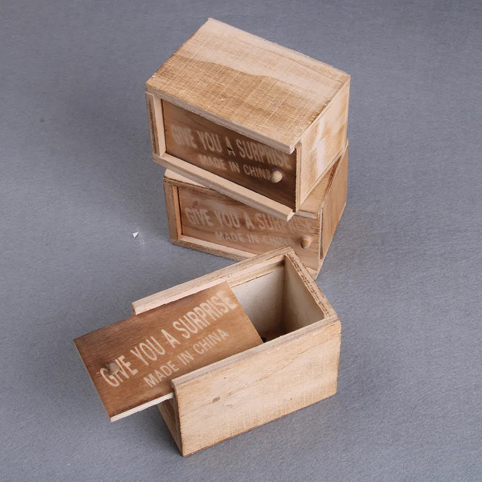 Wooden prank scare box with lifelike jumping animal for April Fools' Day tricks