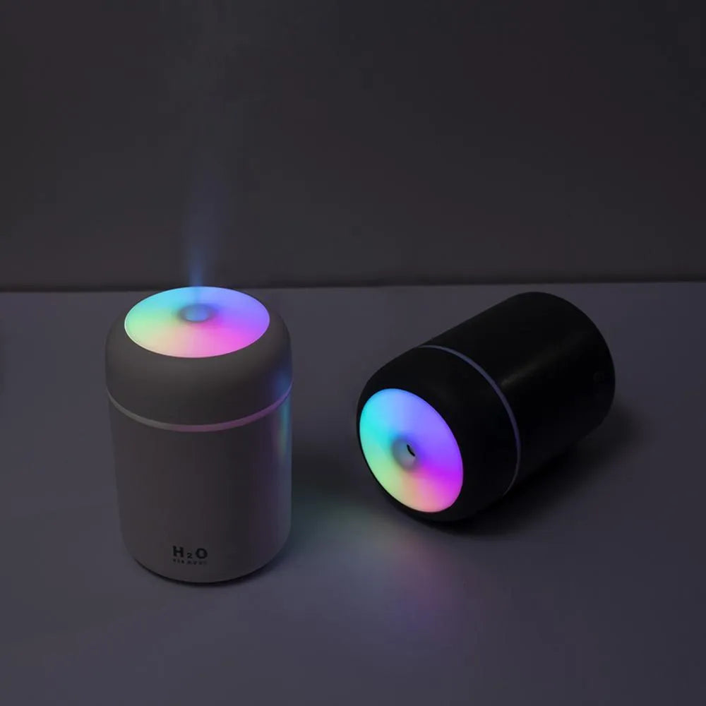 USB desktop humidifier with colourful lights in pink, white, or navy blue colour options