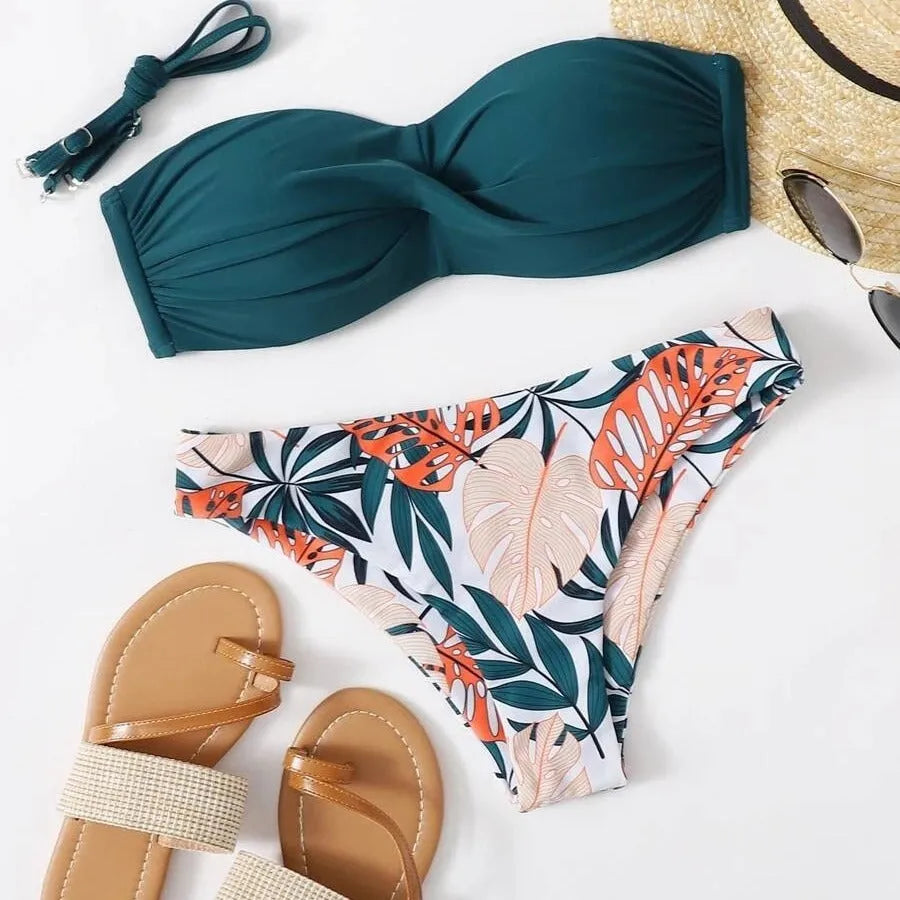 Green split push up bikini set with briefs bottom on a mannequin