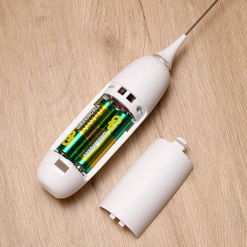 Black and white hand-held electric milk frother blender with modern design for coffee preparation