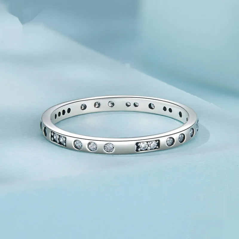 Silver I Love You Moss password ring with oxidized black finish showing engraved code