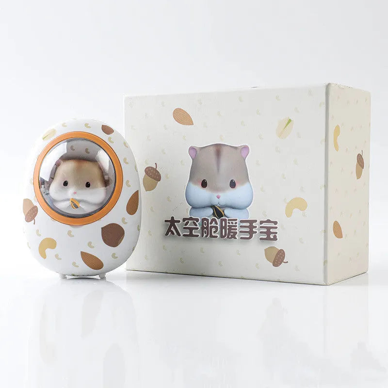 White Hamster hand warmer and power bank unit showing compact dual-function design.