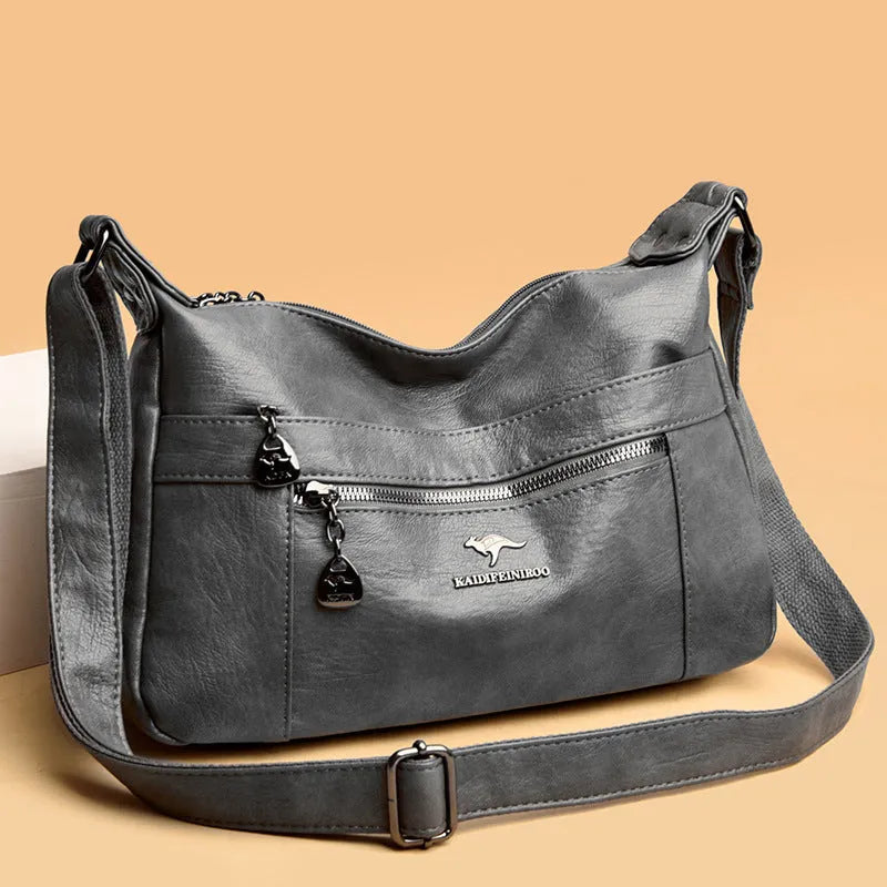 Women's large-capacity single-shoulder PU bag in black, yellow, grey, red, green, blue, or purple