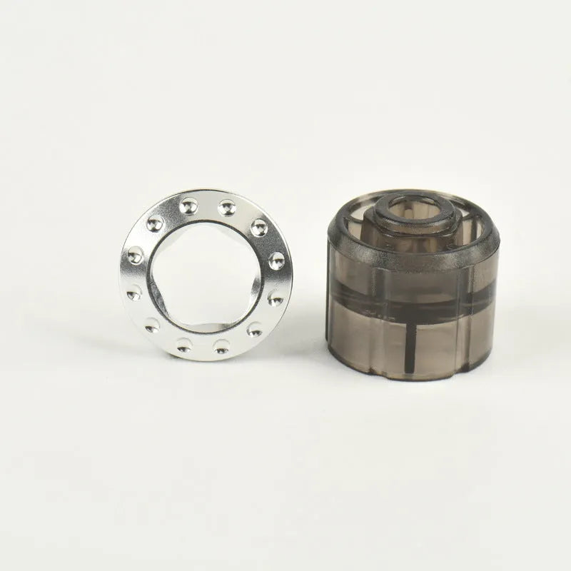 IQO LUMA cigarette holder cap with dismantlement tool for ILUMA Prime, metal construction, colourful circle design