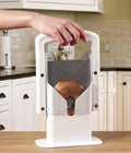 White plastic bagel guillotine slicer with clear acrylic safety shields and stainless steel serrated blade
