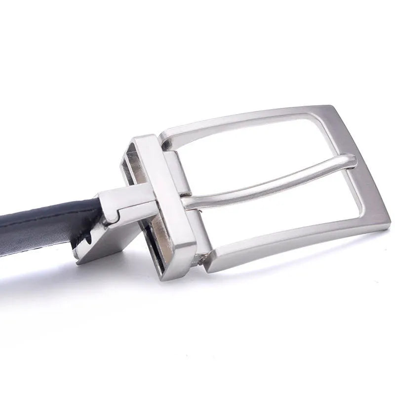 Men's dark brown and black genuine leather belt with a silver rotating pin buckle laid flat.