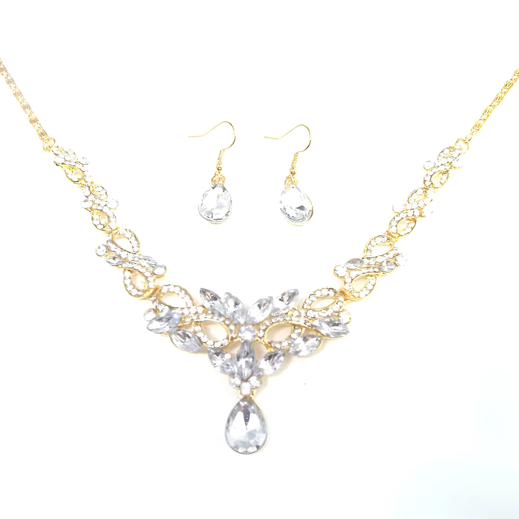 Gold alloy clavicle chain necklace with bow pendant on display