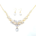 Gold alloy clavicle chain necklace with bow pendant on display