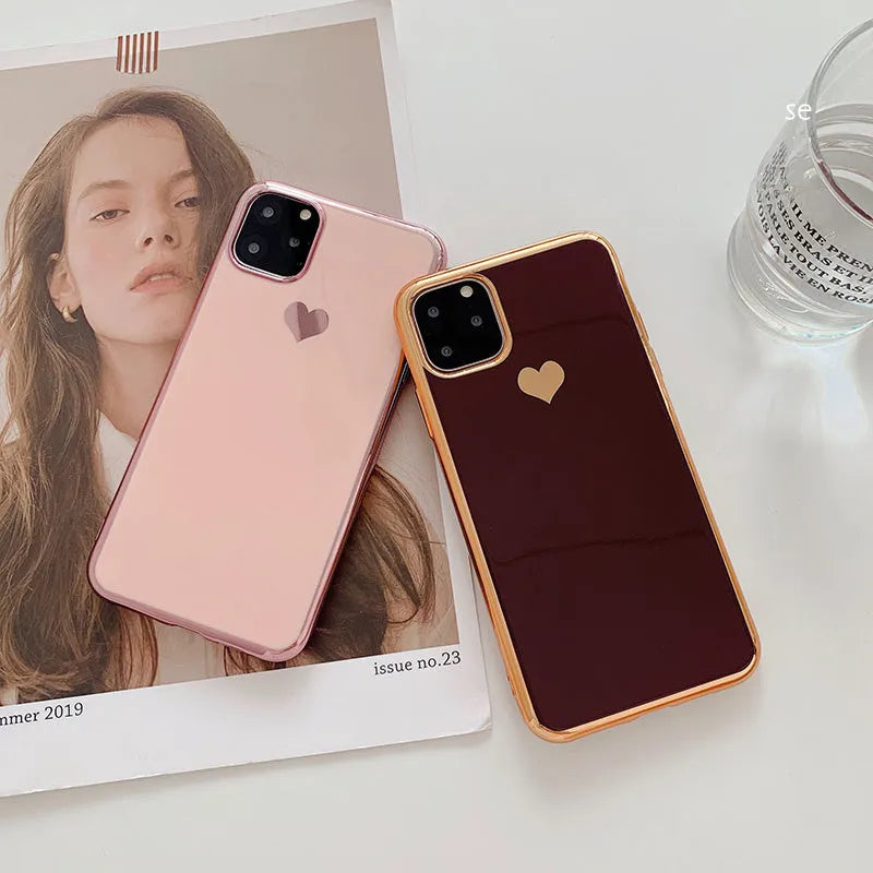 Luxury plating love solid colour TPU back cover case for iPhone on a table.