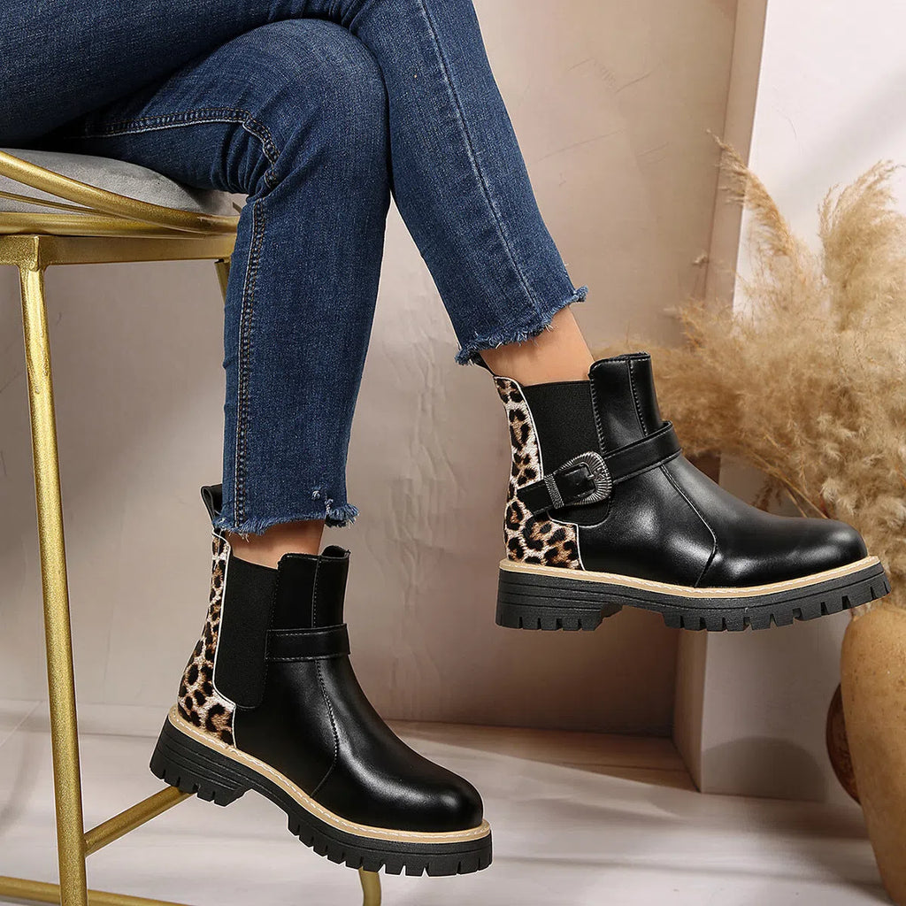 Plus-size women's black leopard print ankle boots with metal buckle, round toe, and mid-heel