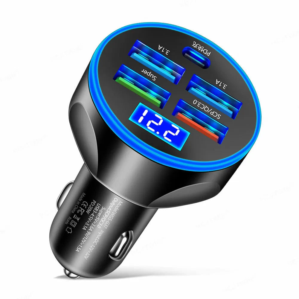 Black five-in-one car charger with digital display and multiple USB ports in a vehicle socket