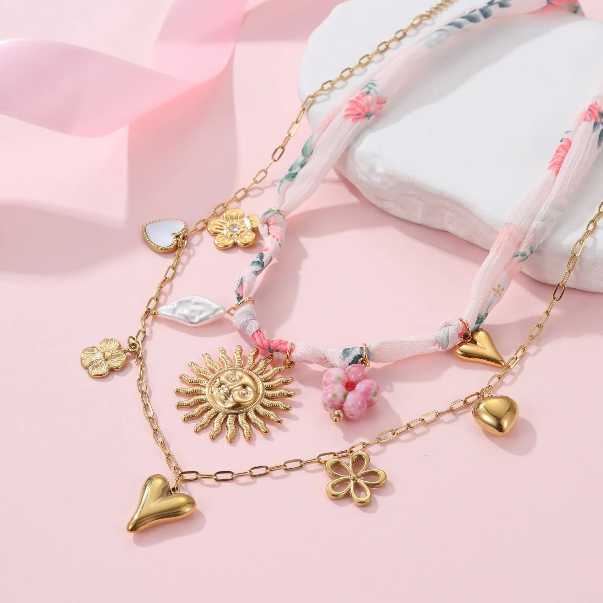 Gold plated stainless steel necklace with sun pendant on 41-50cm chain, heart pendant alternative shown