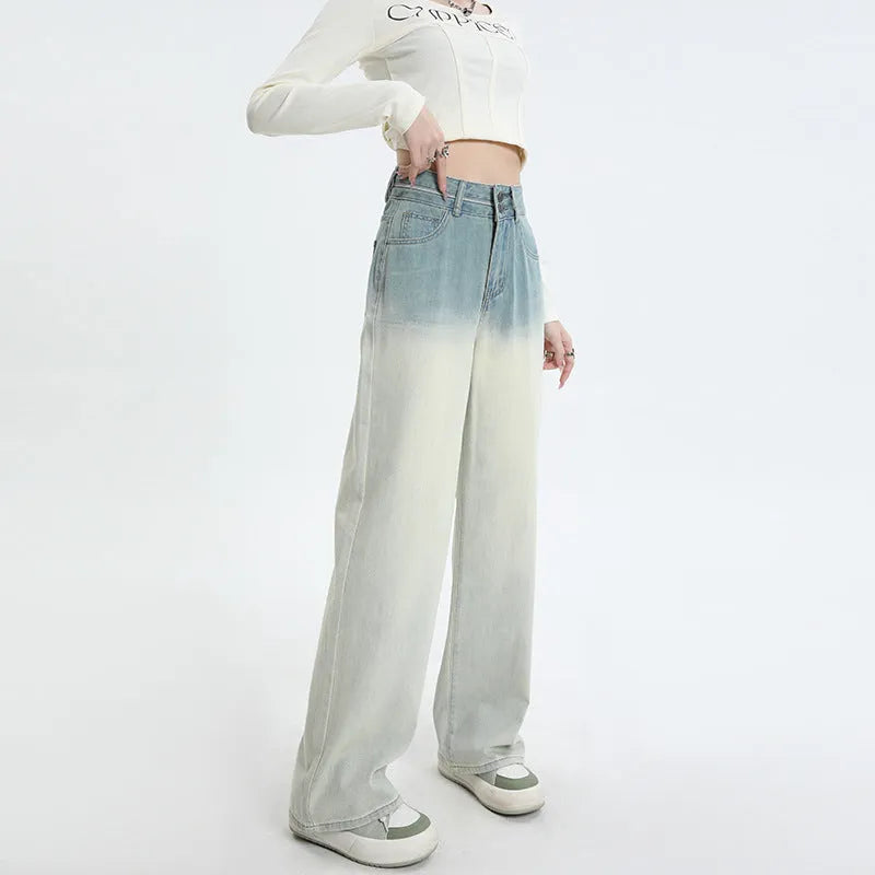 Women's gradient blue straight-leg wide-leg denim trousers laid flat.