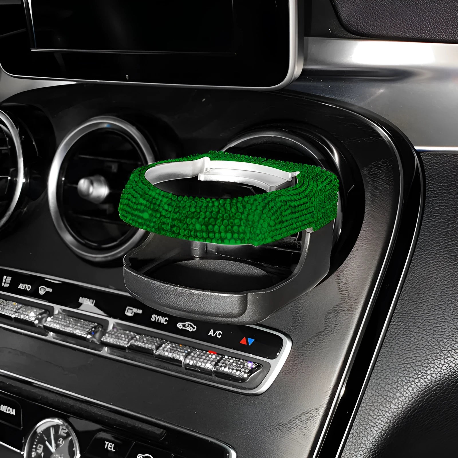 Rhinestone-encrusted white car cup holder bracket mounted on a vehicle air vent.