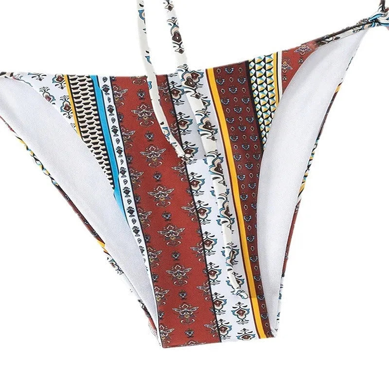 Women's printed lace-up split swimsuit in mixed colour, two-piece set with bra and pants, sleeves design, available in multiple sizes.