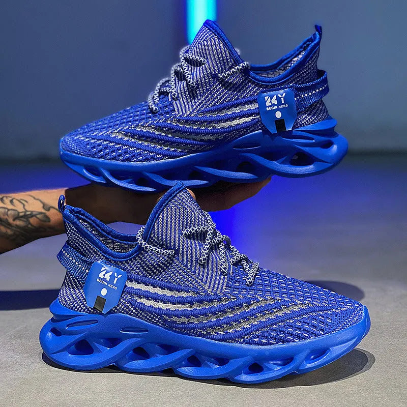 Men's blue Flyknit mesh casual sneaker with a foam sole and platform mid-heel on a white background.