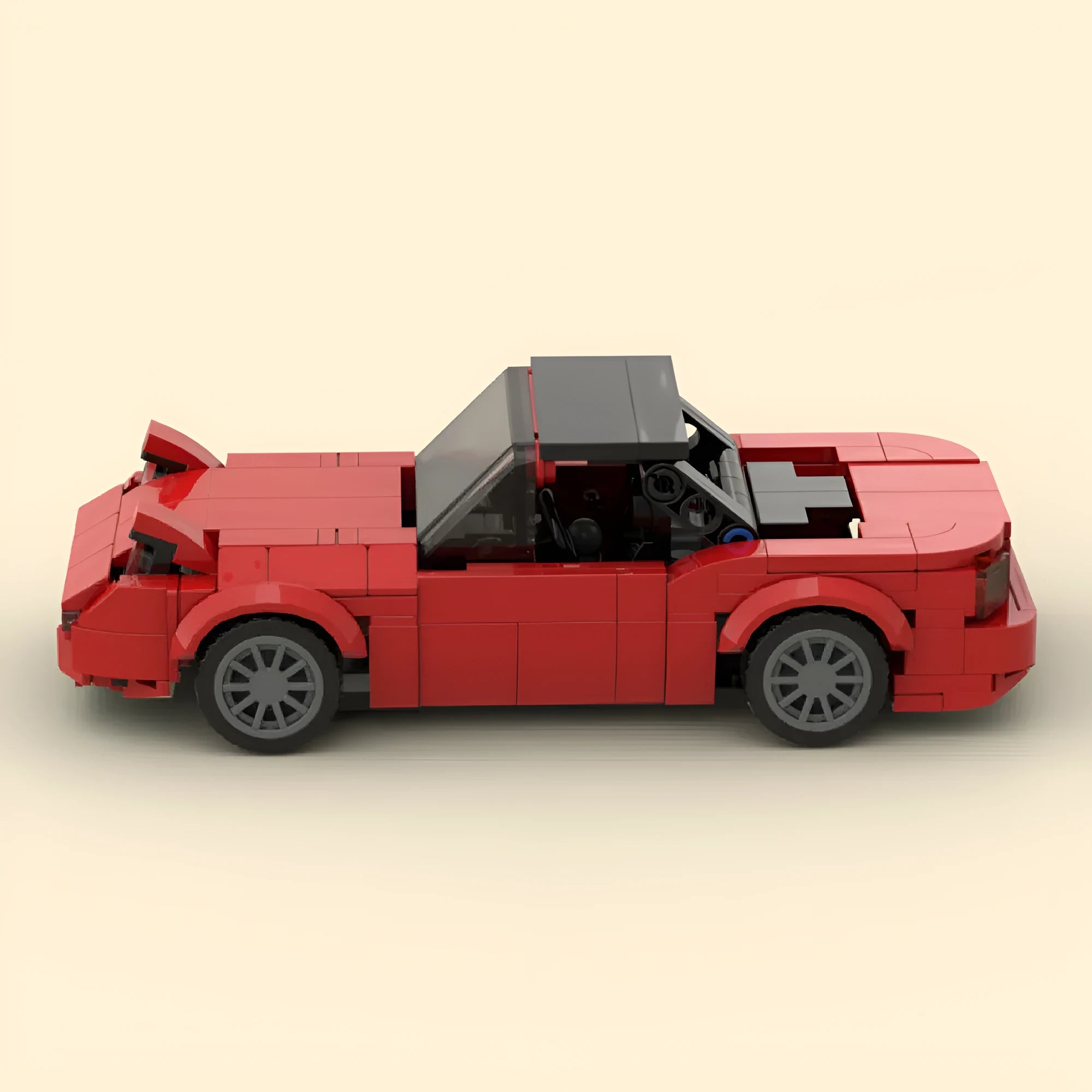 Small particle plastic building blocks sports car model in red colour 16.4 cm long