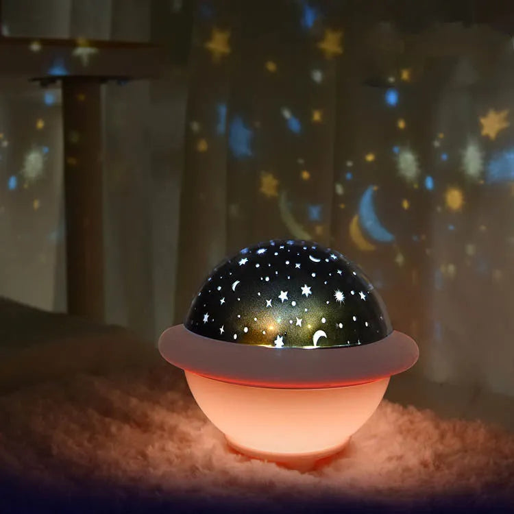 UFO-shaped starry sky projection night light in green, pink or white with 15.1cm cube dimensions
