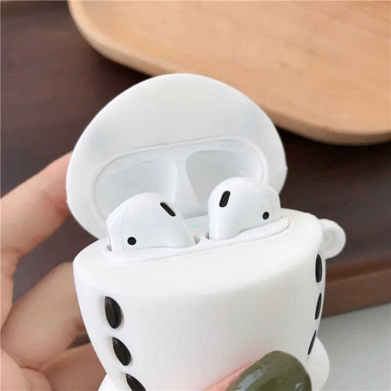 Silicone flip case with cartoon aeroplane design and hook for Apple AirPods 1 and 2.