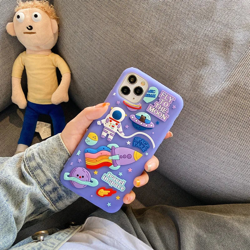 Purple silicone iPhone case with a detailed cartoon astronaut design on the back.