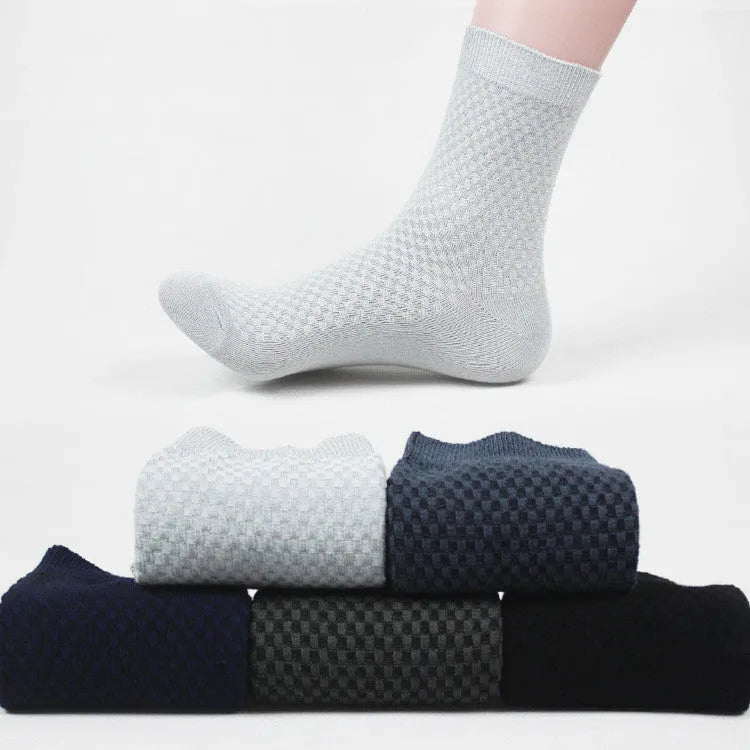 Men's bamboo fibre business socks in a small square pattern, shown in navy blue colour.
