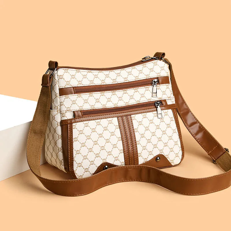 Brown stitching pattern crossbody bag with adjustable strap and polyester lining