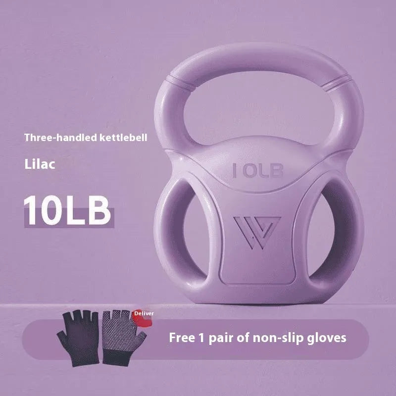 Pink kettlebell 10 lbs with gloves on wooden floor for home exercise