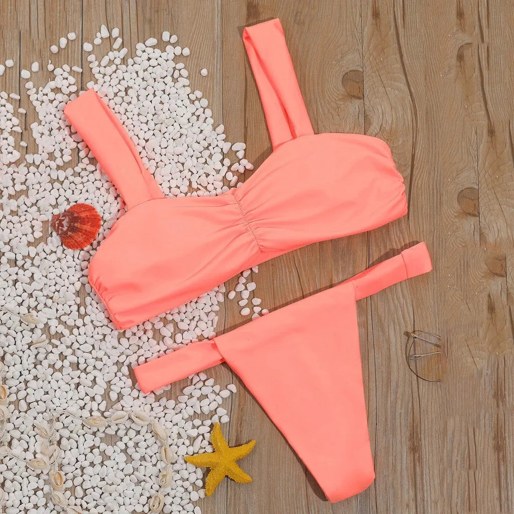 Solid colour split bikini swimsuit in orange with nylon outer and polyester lining, sizes S M L