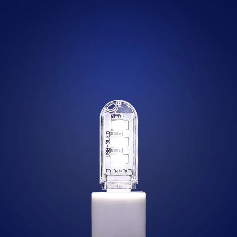 USB-powered baby night light with LED eye protection showing compact 6cm by 1.8cm dimensions